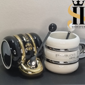 ماگ سرامیکی استارباکس مشکی طلایی و سفید نقره‌ای مدل بشکه‌ای با قاشق